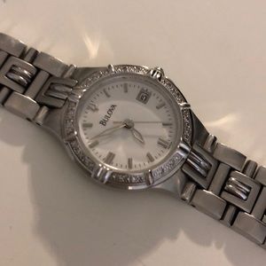 Bulova watch with small diamonds and extra link